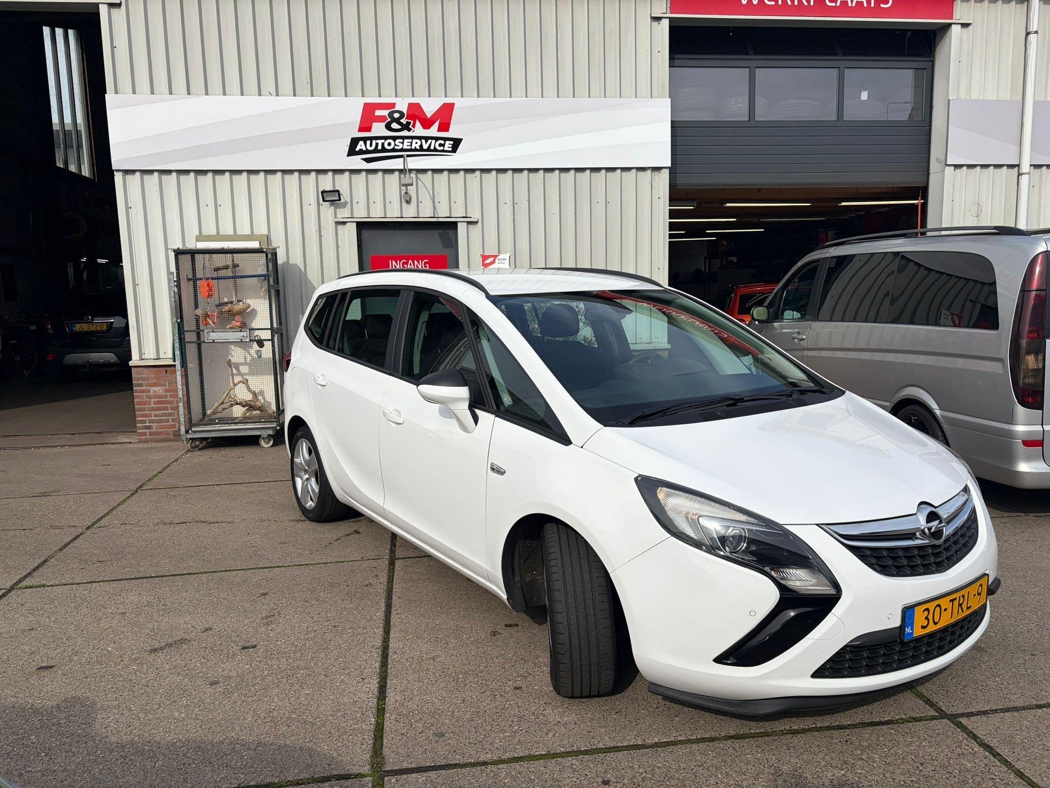 Opel Zafira Tourer 1.4 Edition 5p Automaat, Clima, cruise, p, Auto's, Euro 5, Stof, Zwart, 4 cilinders