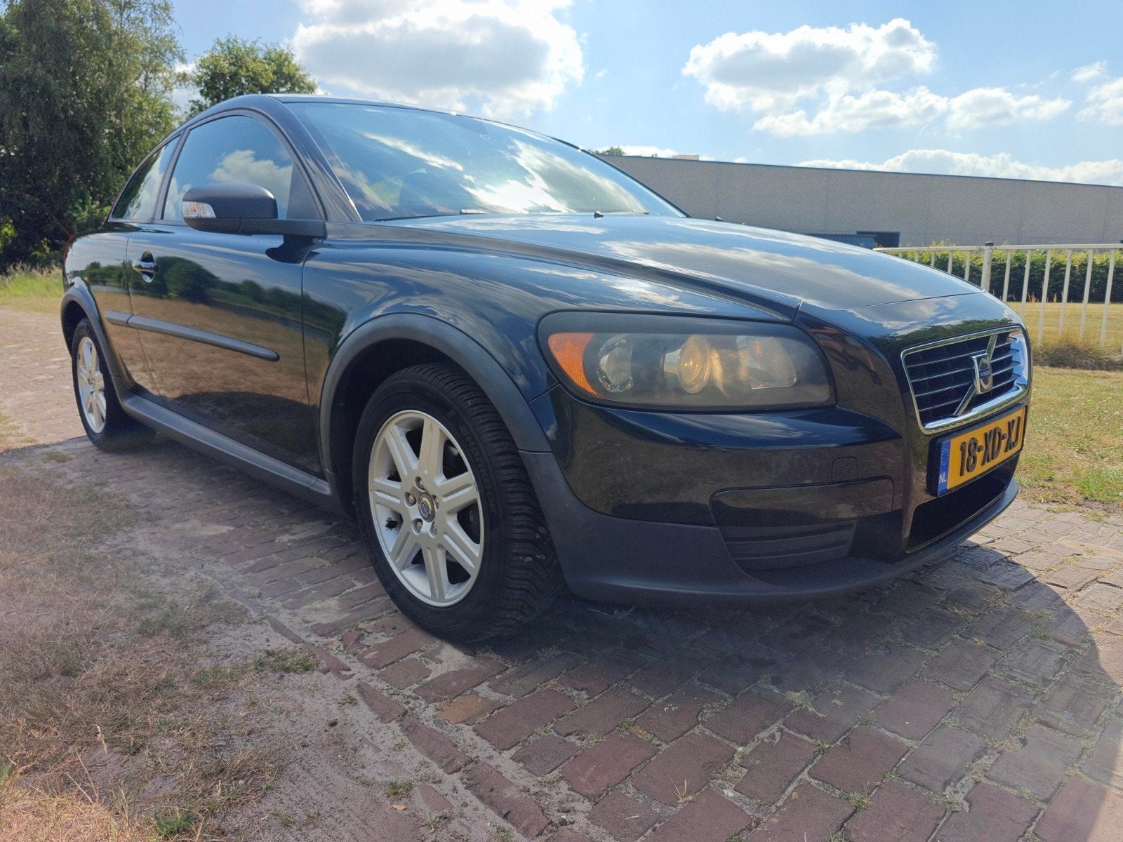 Volvo C30 1.6 Kinetic 2007 Zwart Cruise Airco, Auto's, Volvo, Voorwielaandrijving, Stof, Automatische klimaatregeling, Zwart
