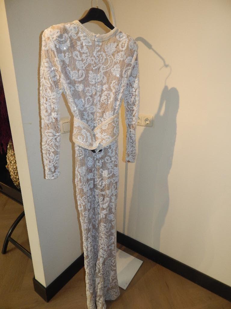 Unique the label jumpsuit kant look nude voering lovertjes S, Kleding | Dames, Jumpsuits, Unique the label, Verzenden, Wit, Zo goed als nieuw