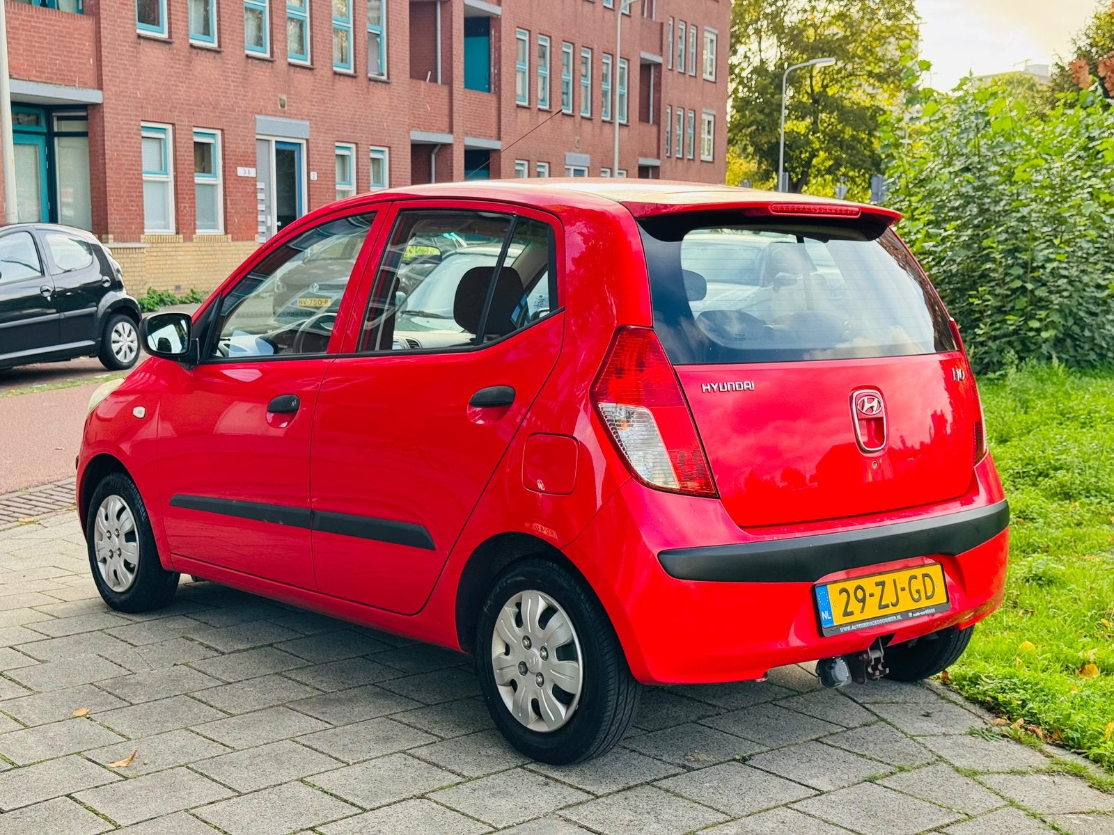 Foto 4 van Hyundai i10 1.1 I 5DR 2008 Rood