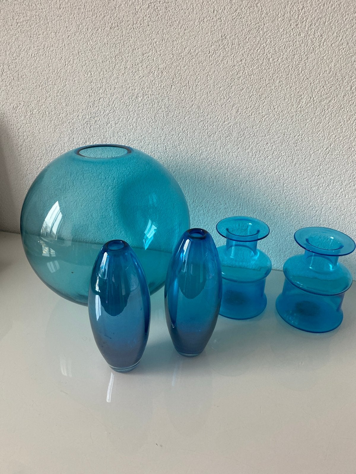 Set van 5 turquoise/ blauwe glazen vazen, Ophalen, Gebruikt, Blauw, Glas