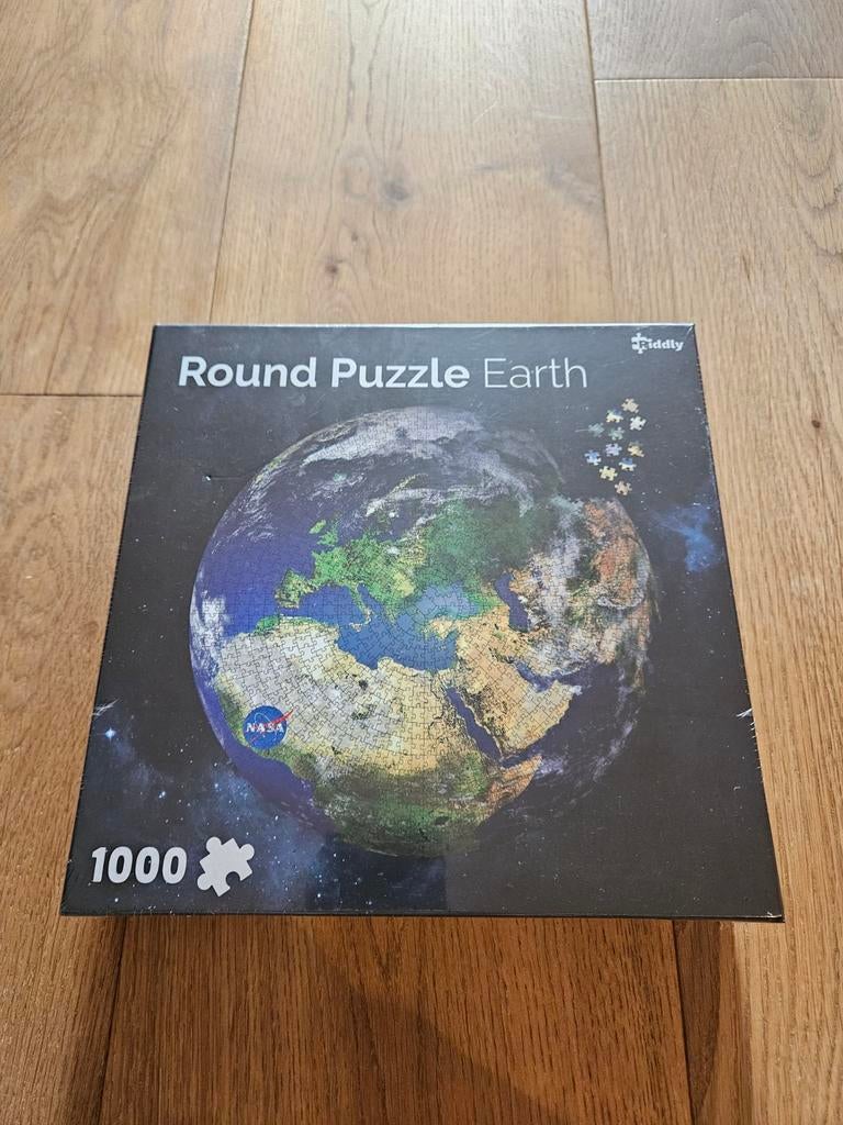 New Riddly round puzzle Earth, 65x65cm, 1000 pcs, Ophalen of Verzenden, 500 t/m 1500 stukjes, Nieuw, Legpuzzel
