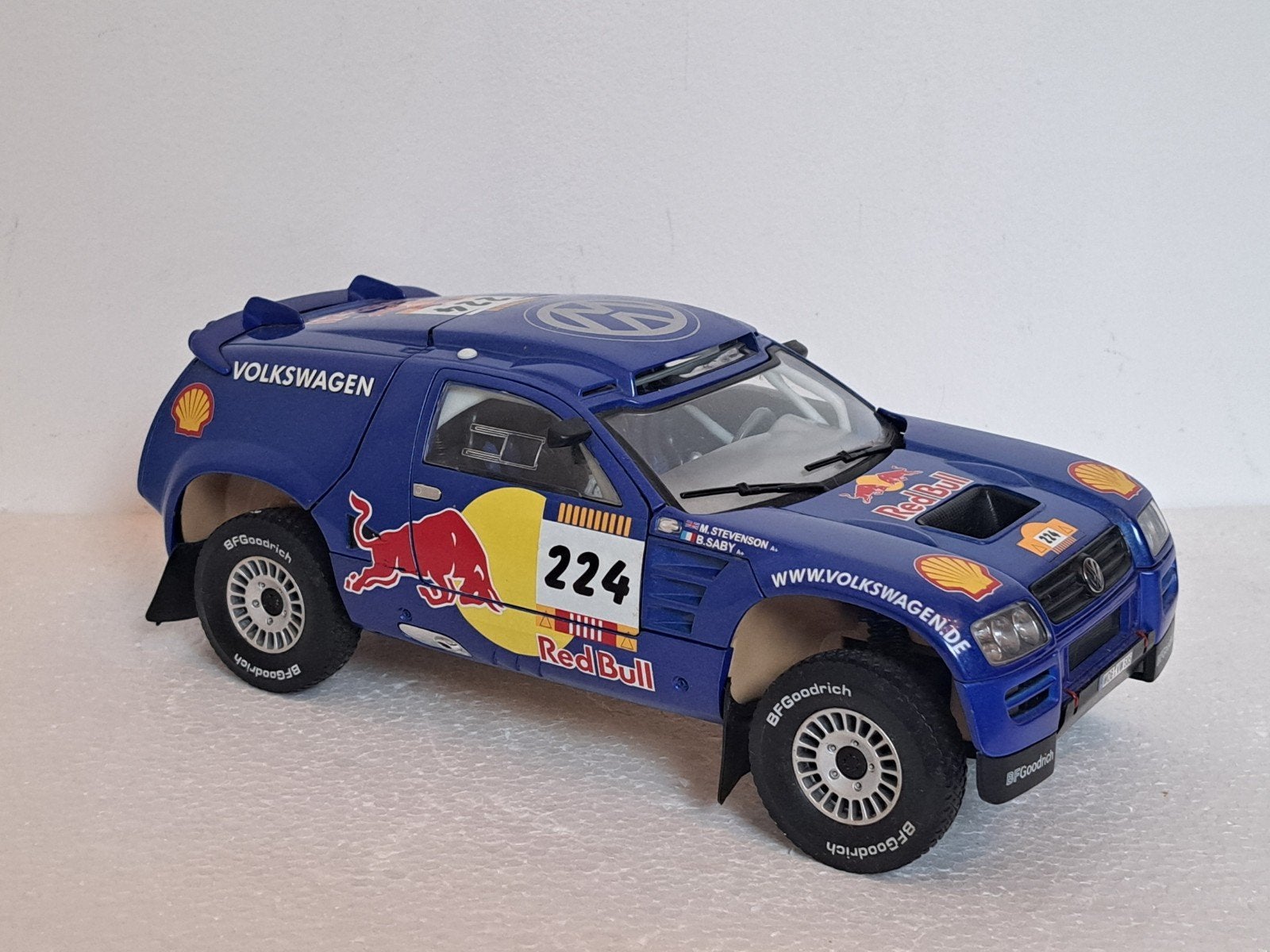 VW Touareg Dakar B Saby 1/18 Bburago UNIEK, Ophalen of Verzenden, Zo goed als nieuw, Auto, Bburago
