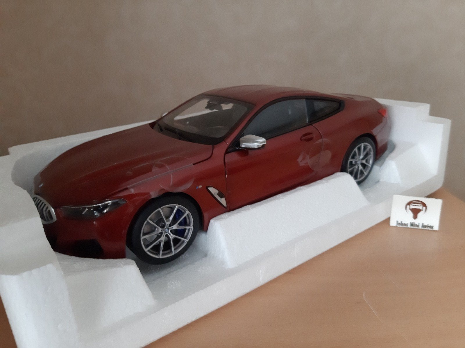 BMW M850i uit 2019 Orange Metallic van Norev HQ 1:18