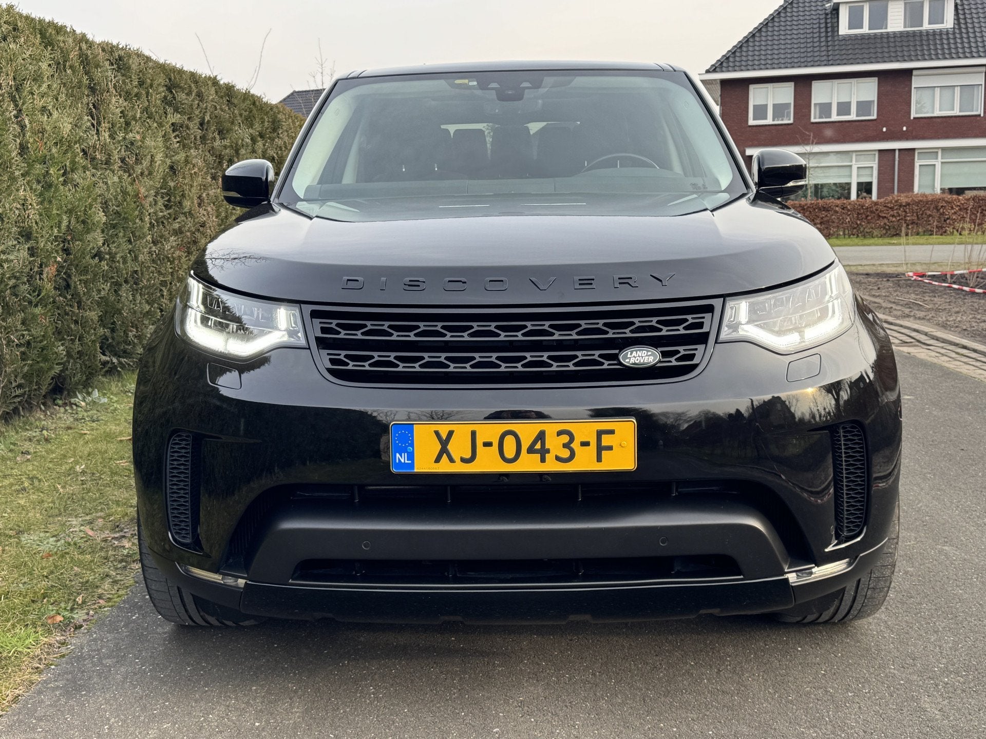 Land Rover Discovery 2.0 Si4 S 7-PERS 301PK PANORAMADAK LEER, Auto's, Automaat, Gebruikt, 4 cilinders, 7 stoelen