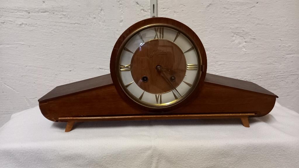 Pendule Klok, Ophalen