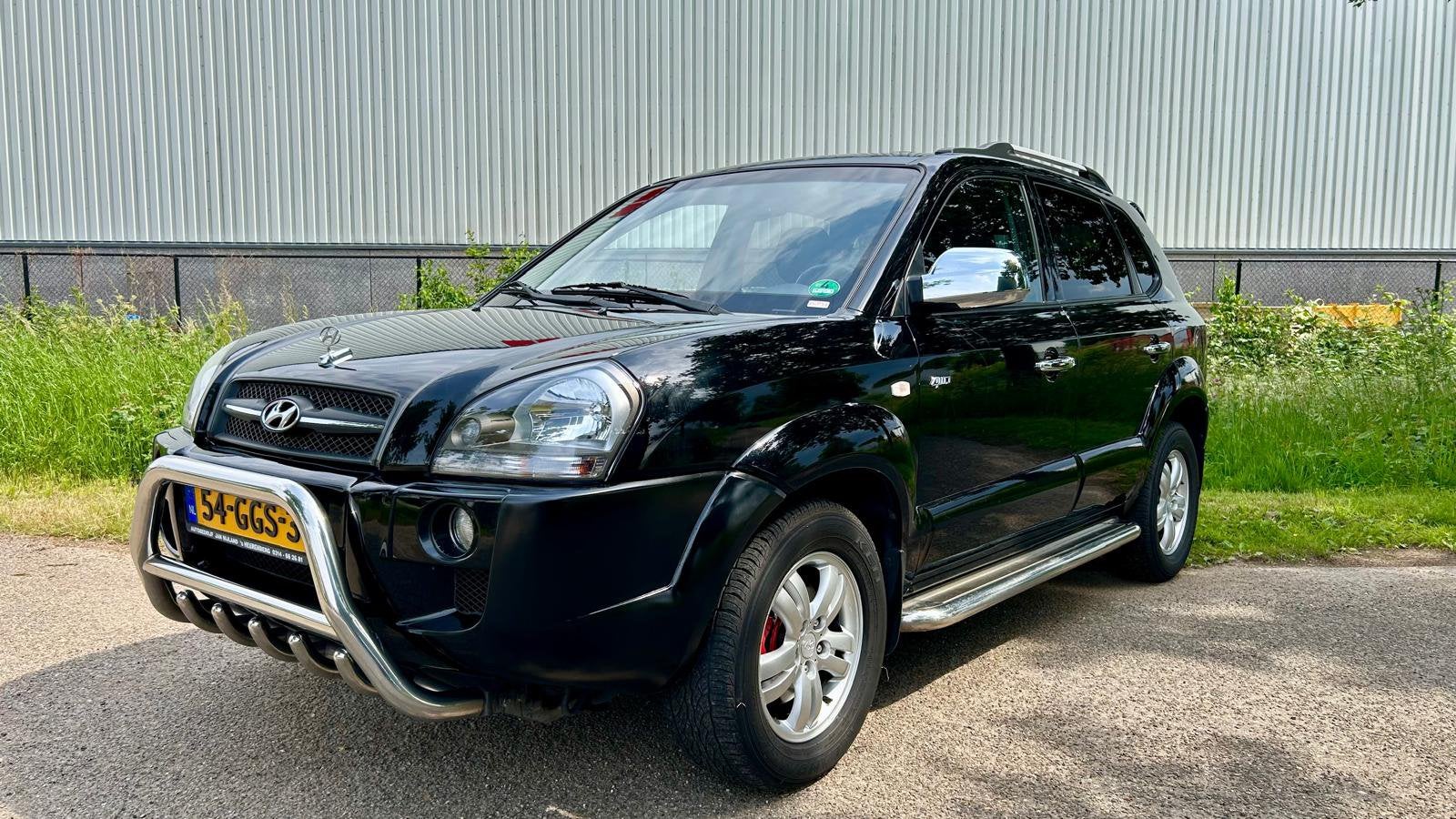Hyundai Tucson V6 4WD Automaat / Clima / Cruise / Trekhaak, Auto's, Hyundai, Bedrijf, Tucson, 4x4, ABS, Airconditioning, Automatische klimaatregeling