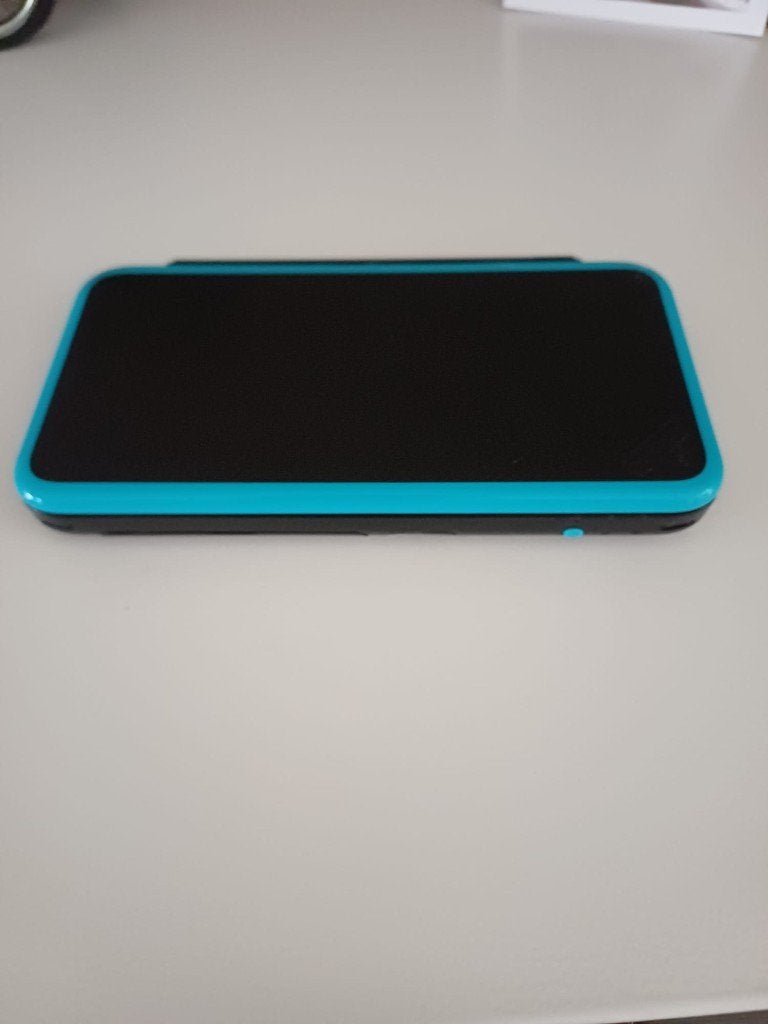 2DS XL Turquoise/Zwart met 8 games, Ophalen, Blauw, 2DS XL, Zo goed als nieuw