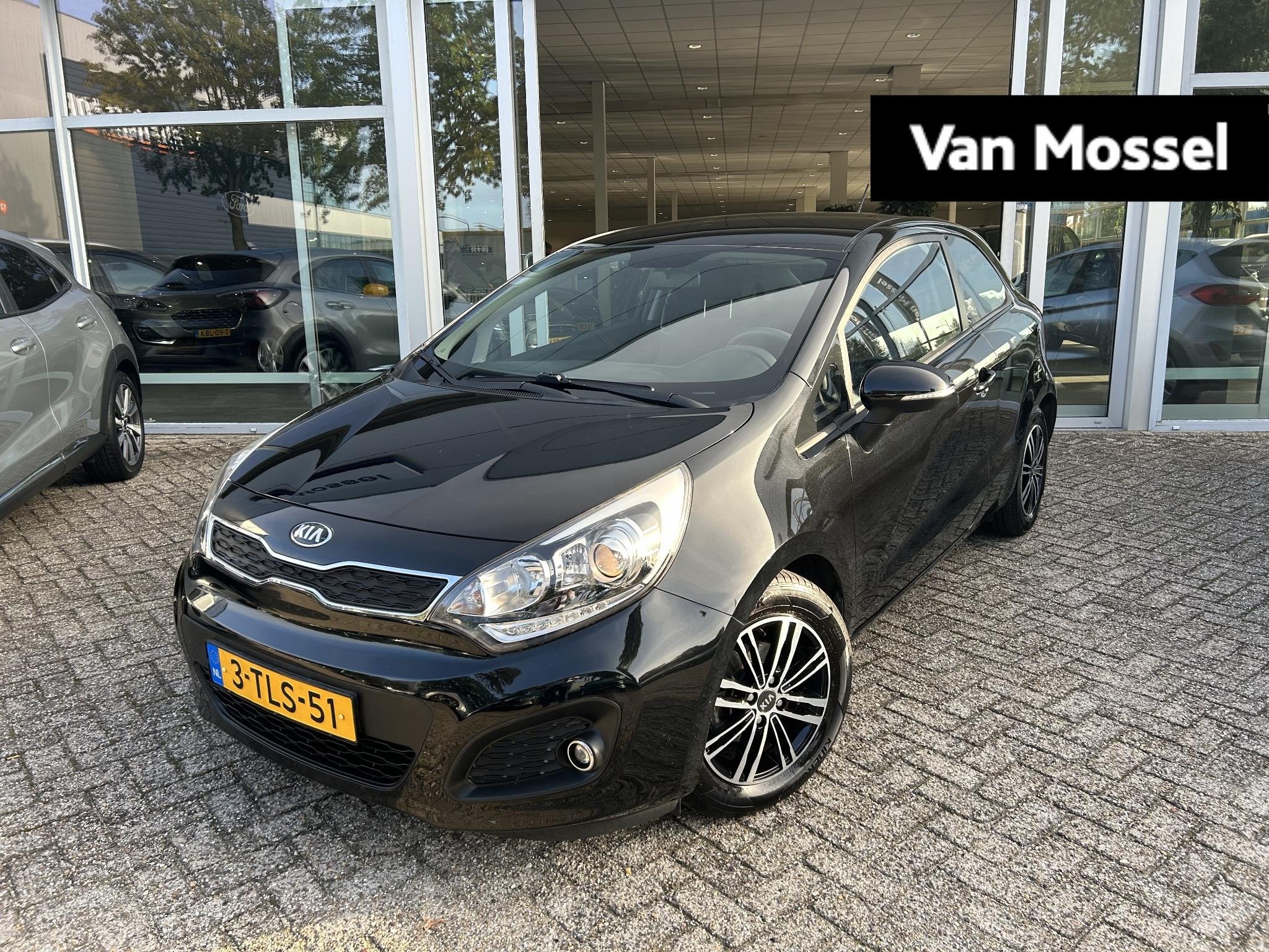 Kia Rio 1.2 CVVT Plus Pack, Auto's, 4 cilinders, Zwart, Origineel Nederlands, Handgeschakeld