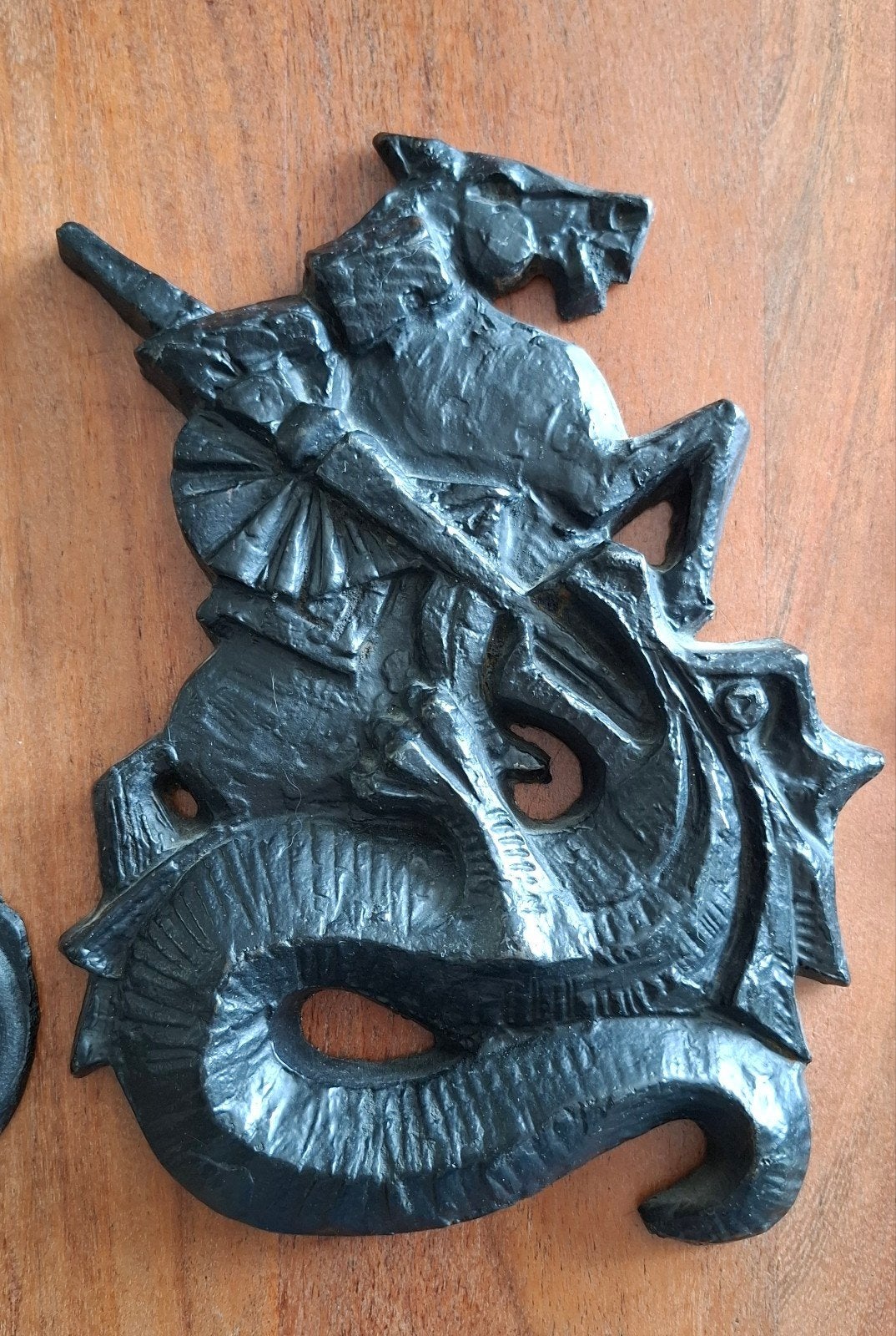 wanddecoratie draak gietijzer, Ophalen