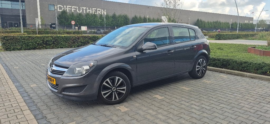 Opel Astra 1.6 16V 5D 85KW 2011 Grijs, Voorwielaandrijving, Stof, Zwart, 4 cilinders