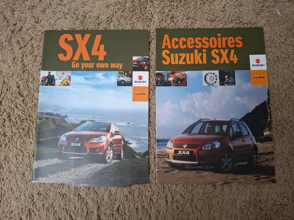 2x autofolder Suzuki SX4, Verzenden, Zo goed als nieuw, Overige merken