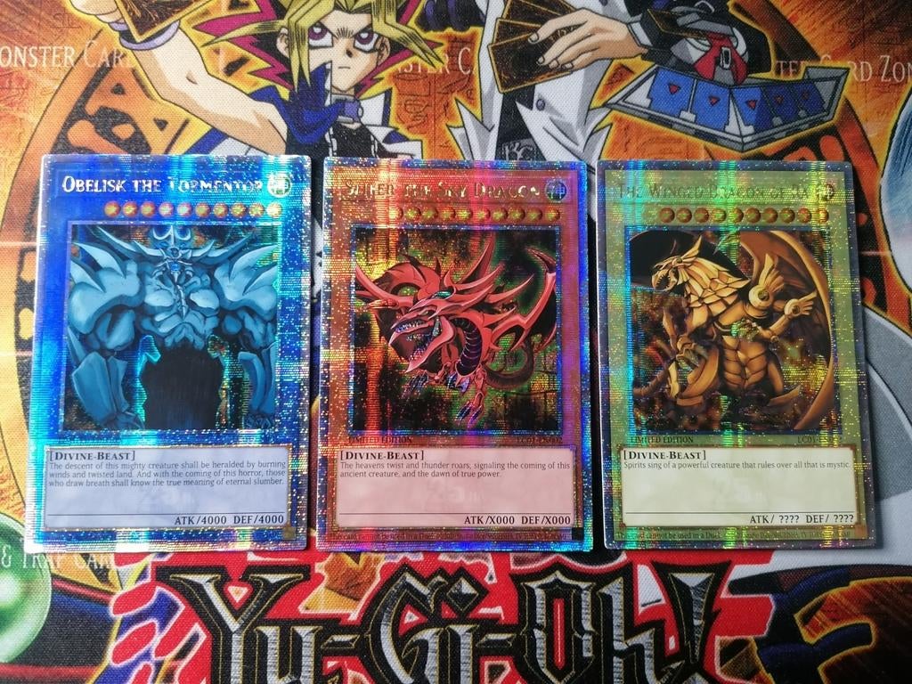 Egyptian God Set - Quarter Century Secret Rare QCSR LC25 YGO, Ophalen of Verzenden, Zo goed als nieuw, Meerdere kaarten, Foil