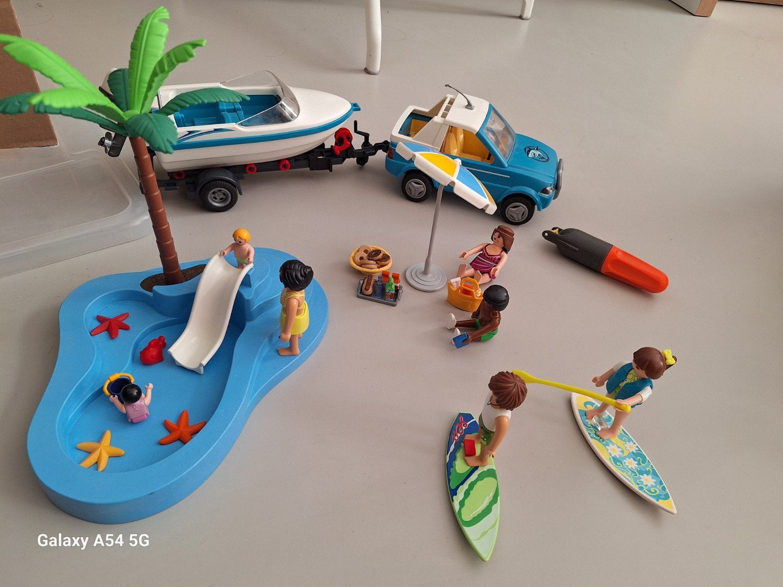 Playmobil zwembadje en zwembad met werkende boot en auto., Ophalen, Zo goed als nieuw