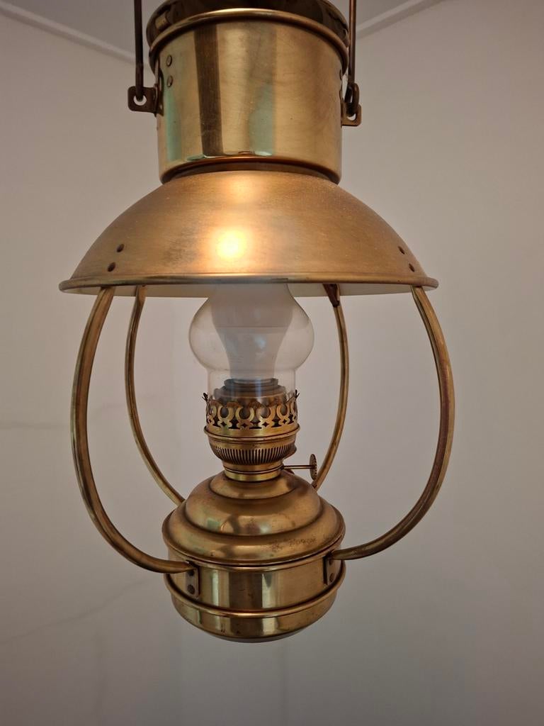 Messing scheepslamp, Ophalen