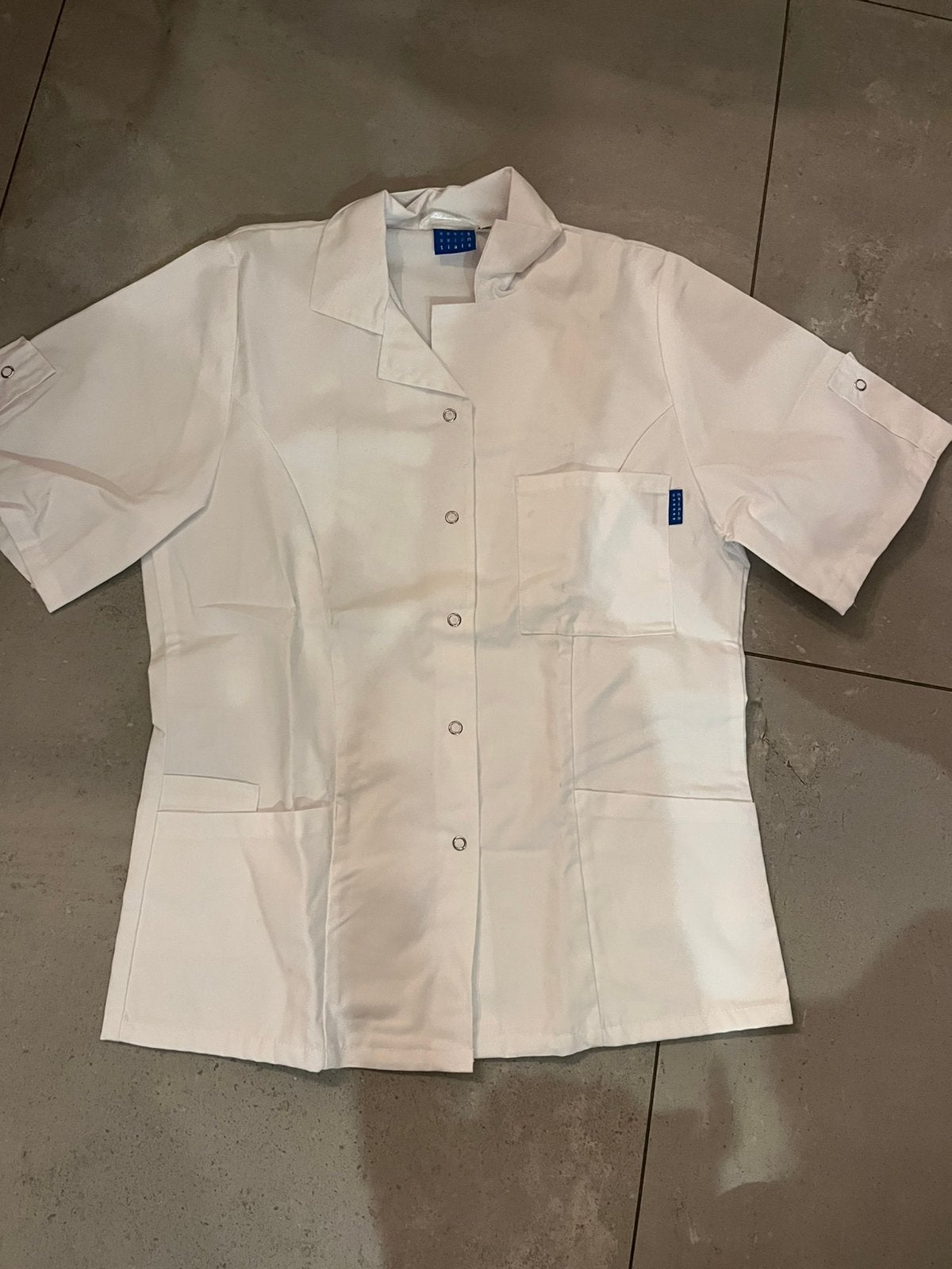Verpleegkundige kleding, Ophalen, Zo goed als nieuw