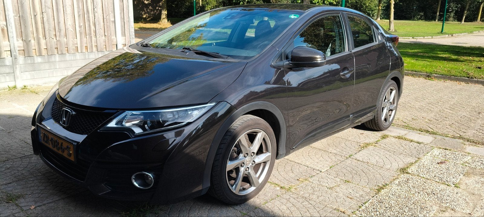 Honda Civic 1.4 100pk 2015 Bruin, Auto's, Voorwielaandrijving, 4 cilinders, Bruin, 1200 kg