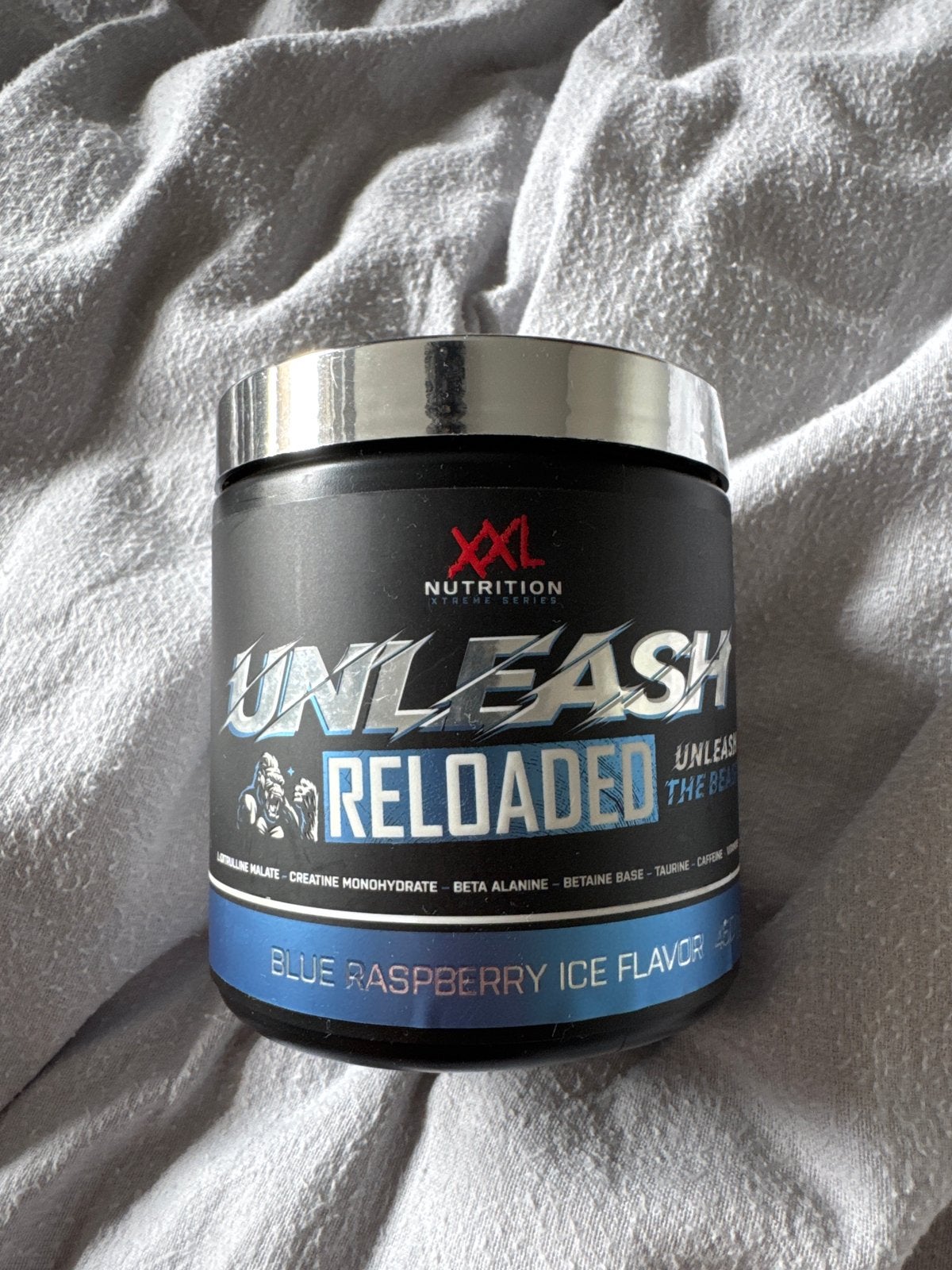 XXL Nutrition Unleash Reloaded Blue Raspberry Ice, Sport en Fitness, Ophalen, Nieuw, Poeder of Drank