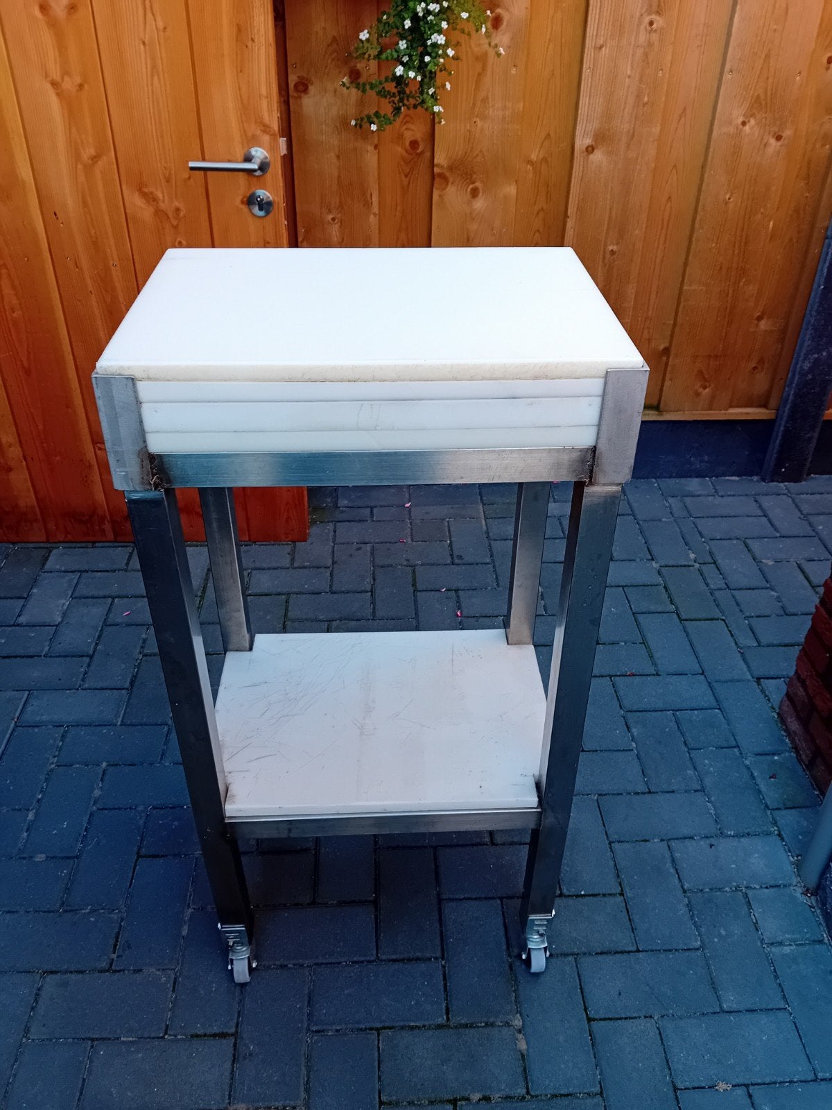 RVS Hakblok met Kunststof Platen op Wielen, Ophalen