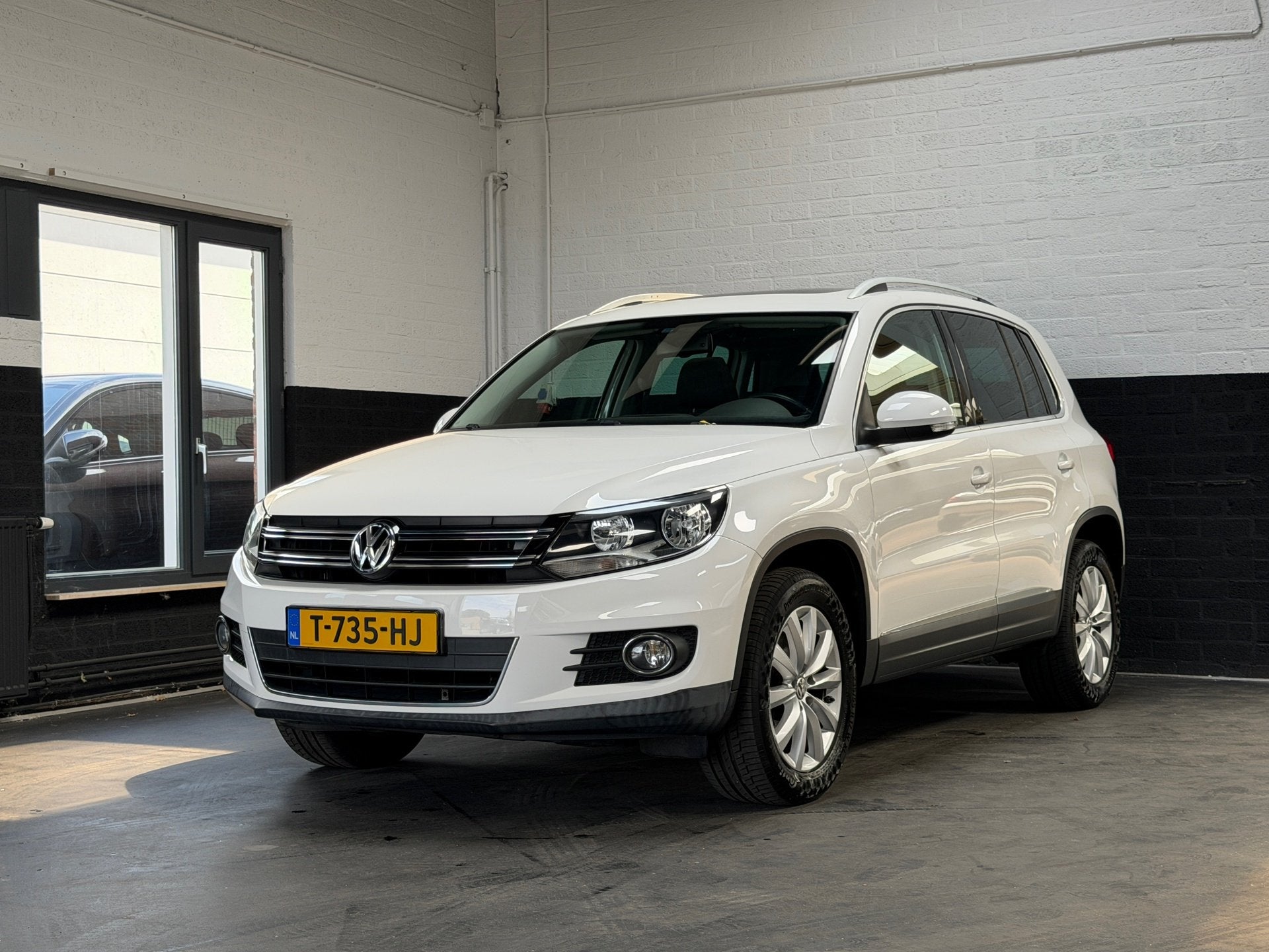 Volkswagen Tiguan 1.4 TSI Comfort&Design | Pano | Navi | Cli, Auto's, Voorwielaandrijving, Euro 5, 15 km/l, Gebruikt