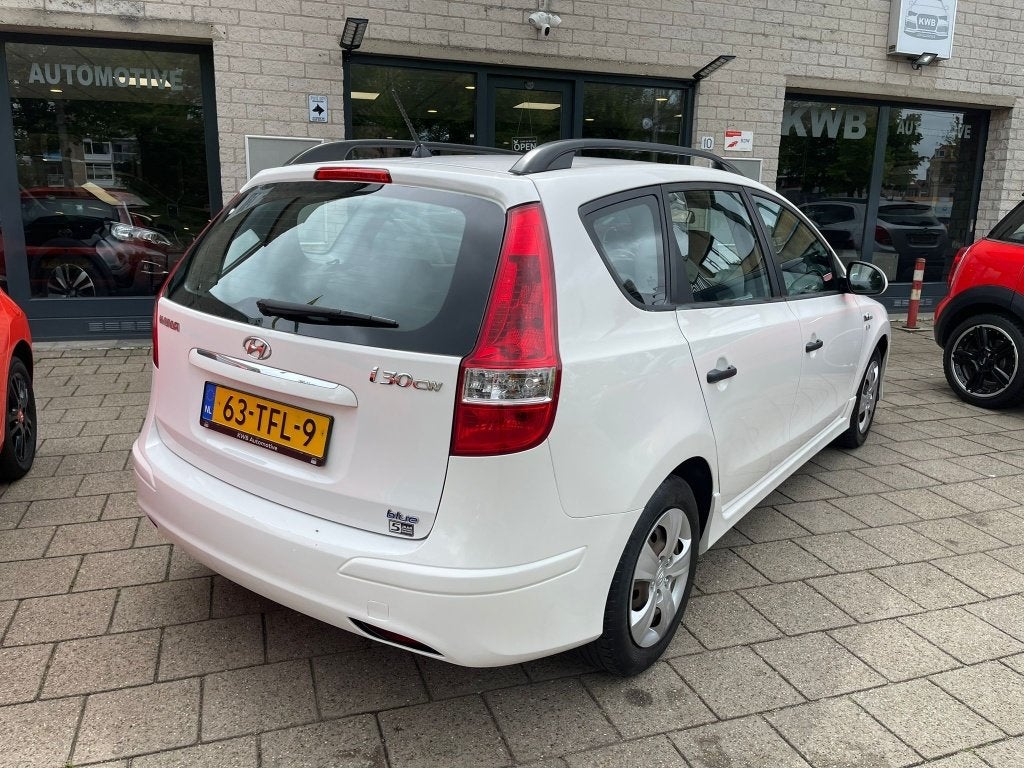 Hyundai I30 CW 1.4i i-Drive Cool Airco Nieuwe apk NAP, Voorwielaandrijving, Euro 5, Gebruikt, 4 cilinders