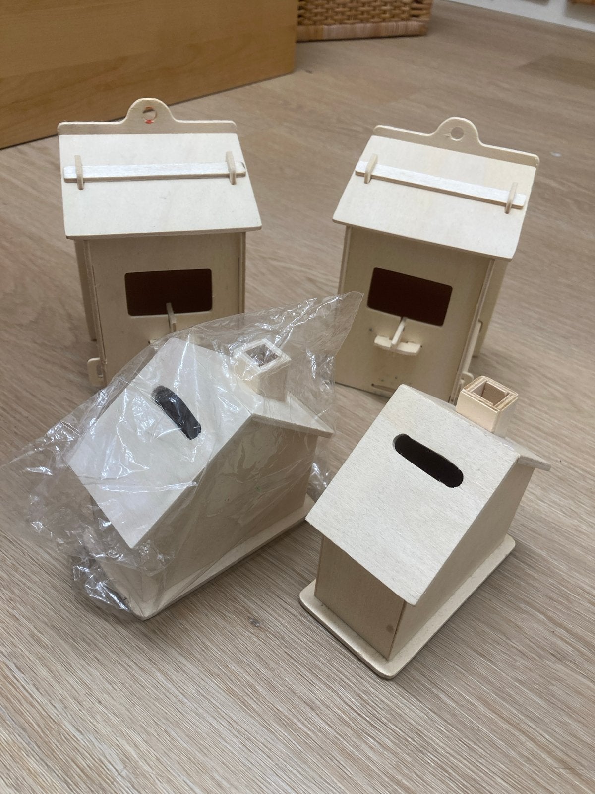 2x Houten spaarpotjes en vogelhuisjes, Ophalen of Verzenden, Zo goed als nieuw