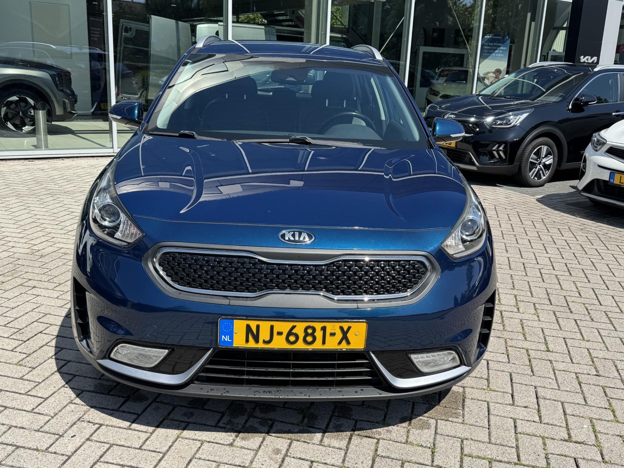 Kia Niro 1.6 GDi Hybrid First Edition, Auto's, Gebruikt, Euro 6, 2 kWh, Blauw