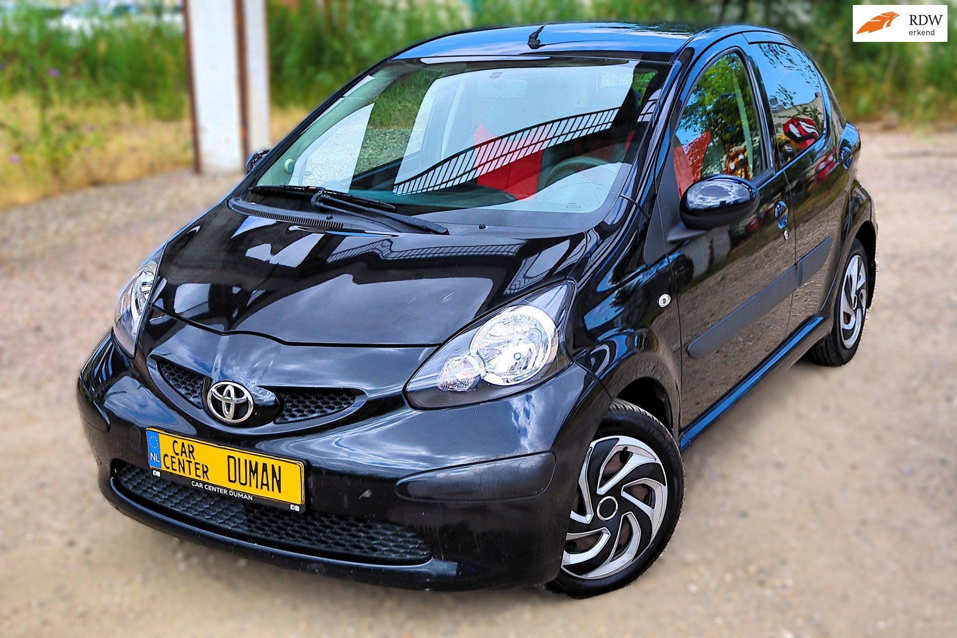 Toyota Aygo 1.0-12V + PDC ELEKT RAMEN HALFLEER 5 DEURS NAP, Auto's, Toyota, Voorwielaandrijving, Gebruikt, 4 stoelen, Leder en Stof