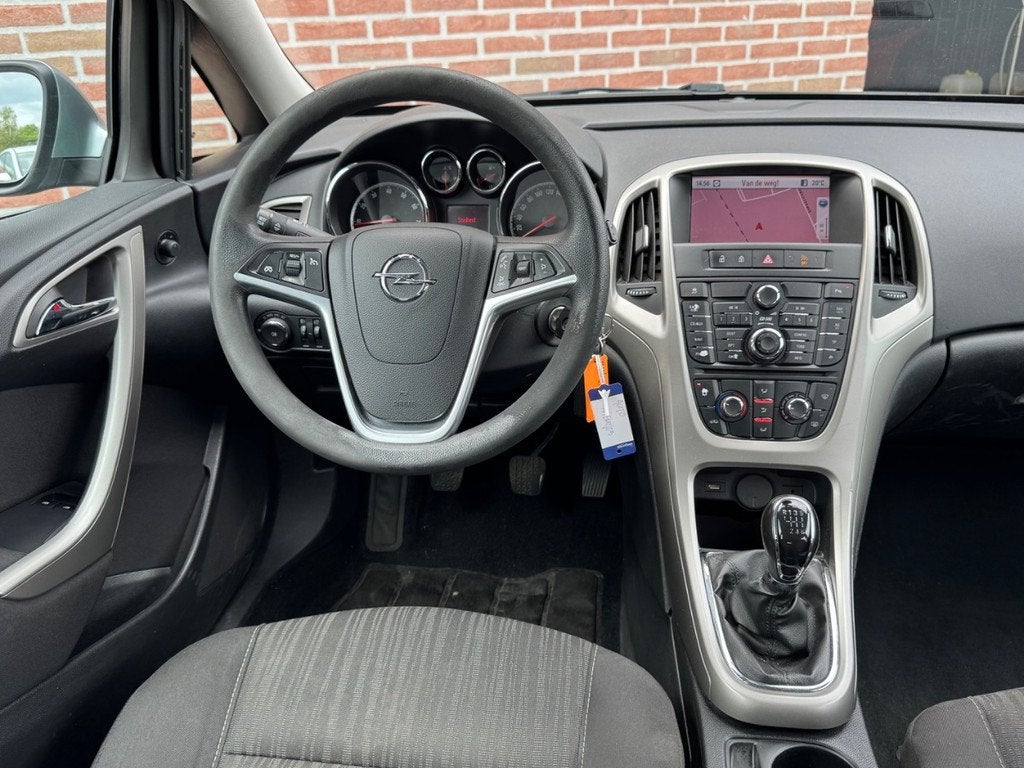 Opel Astra Sports Tourer 1.4 Turbo | Edition | Airco | Cruis, Auto's, Euro 5, Gebruikt, Parkeersensor, 4 cilinders