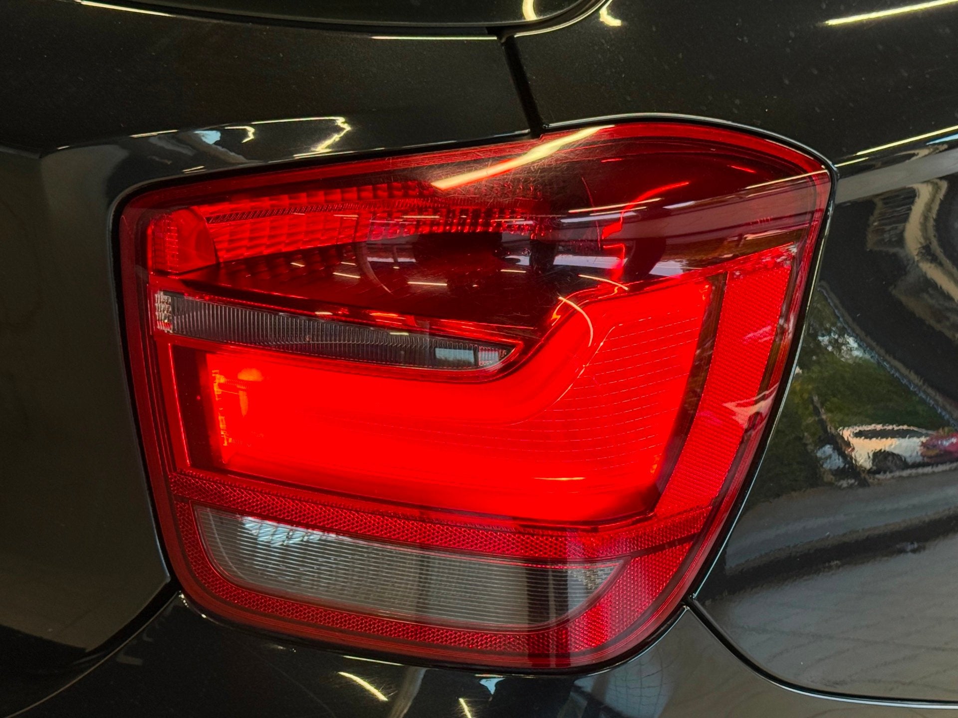 Foto 19 van BMW 1-serie 116D Business 2012 Zwart AIRCO|NAVI|XENON|NAP!