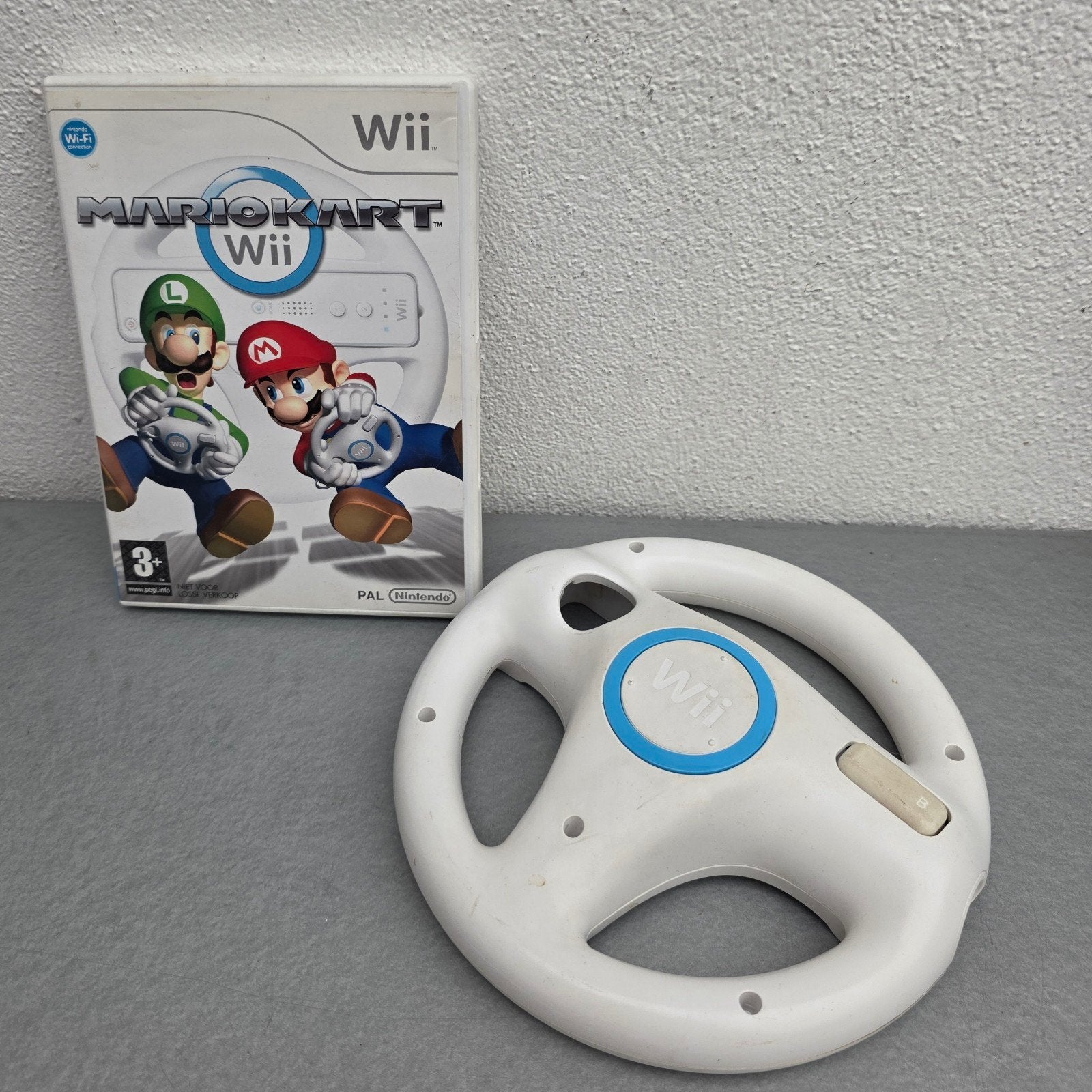 Mario Kart Wii met stuur - Raceplezier voor iedereen!, Spelcomputers en Games, Games | Nintendo Wii, Racen en Vliegen, Ophalen of Verzenden