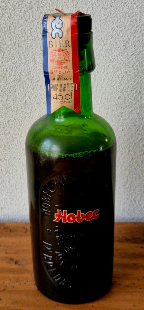 Verzamelaar BREDA imp. oud apart vol flesje HOBEC bier, Verzamelen, Biermerken, Ophalen of Verzenden, Zo goed als nieuw, Flesje(s)