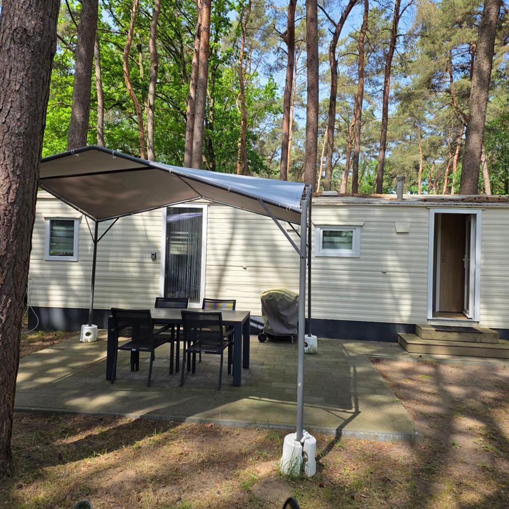 Stacaravan in bosrijke omgeving Goolderheide met airco