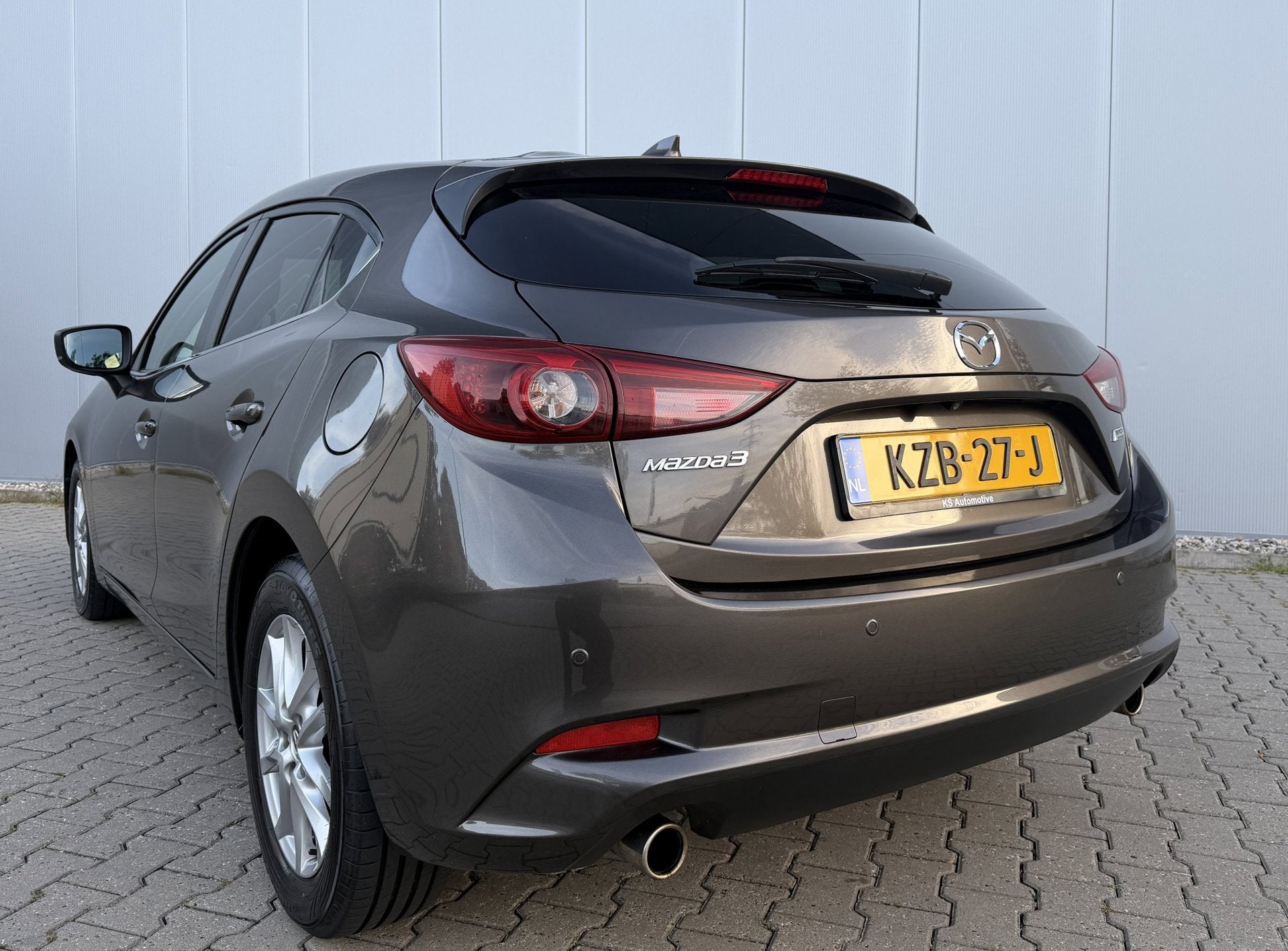 Mazda 3 2.0 SkyActiv-G 120 GT-M Automaat, Auto's, Gebruikt, Euro 6, 4 cilinders, Bruin