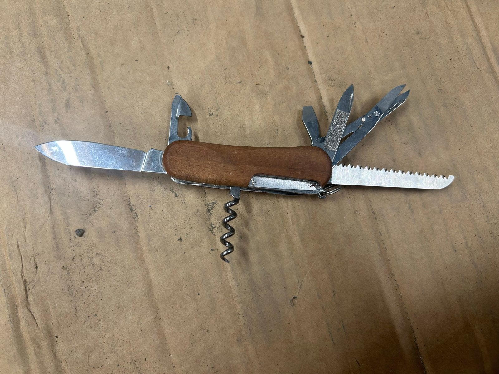 Victorinox Zwitsers zakmes met houten handvat, Ophalen of Verzenden, Gebruikt, Multitool, Overige merken