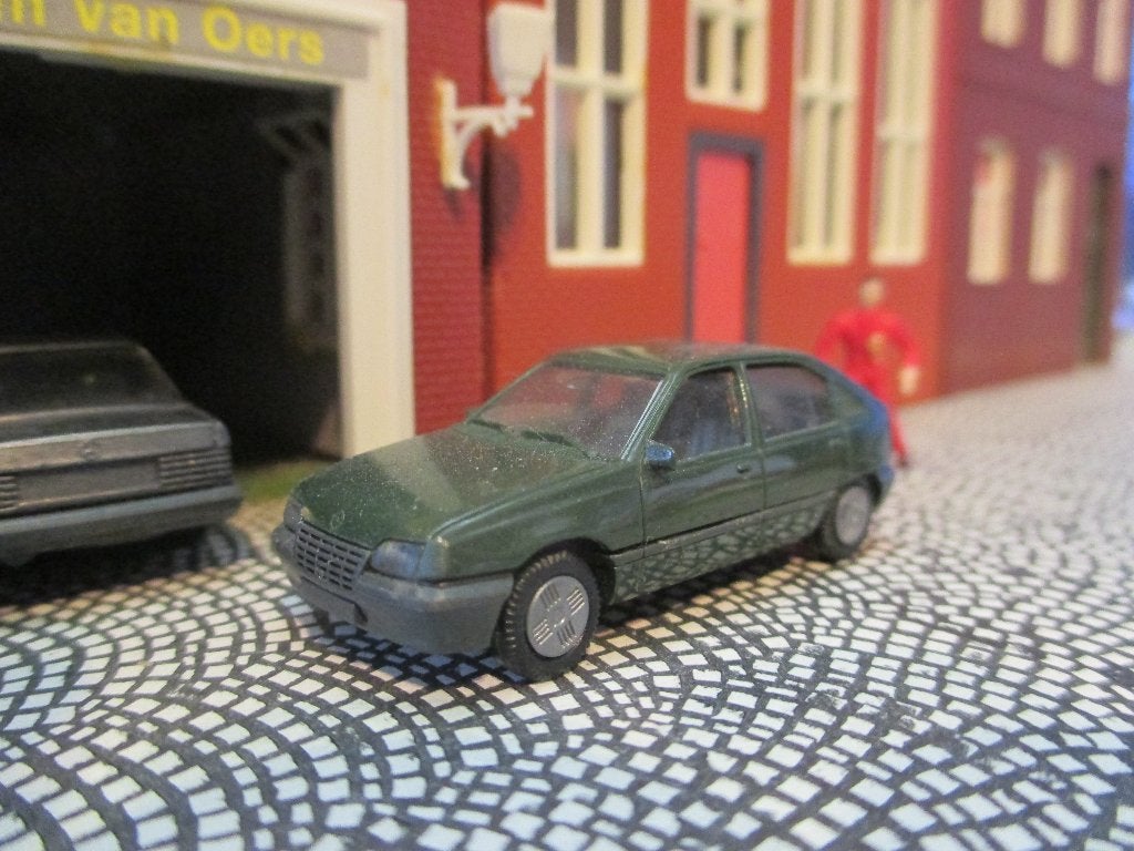Opel Kadett E 5-deurs hatchback - Herpa groen, Ophalen of Verzenden, Zo goed als nieuw, Auto, Herpa