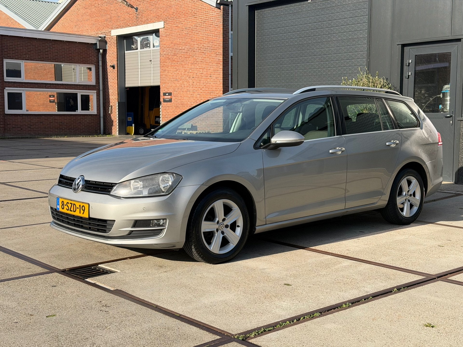 Volkswagen Golf Variant 1.2 TSI Highline Cruise Navi Trekhaa, Auto's, Voorwielaandrijving, Gebruikt, Zwart, 4 cilinders