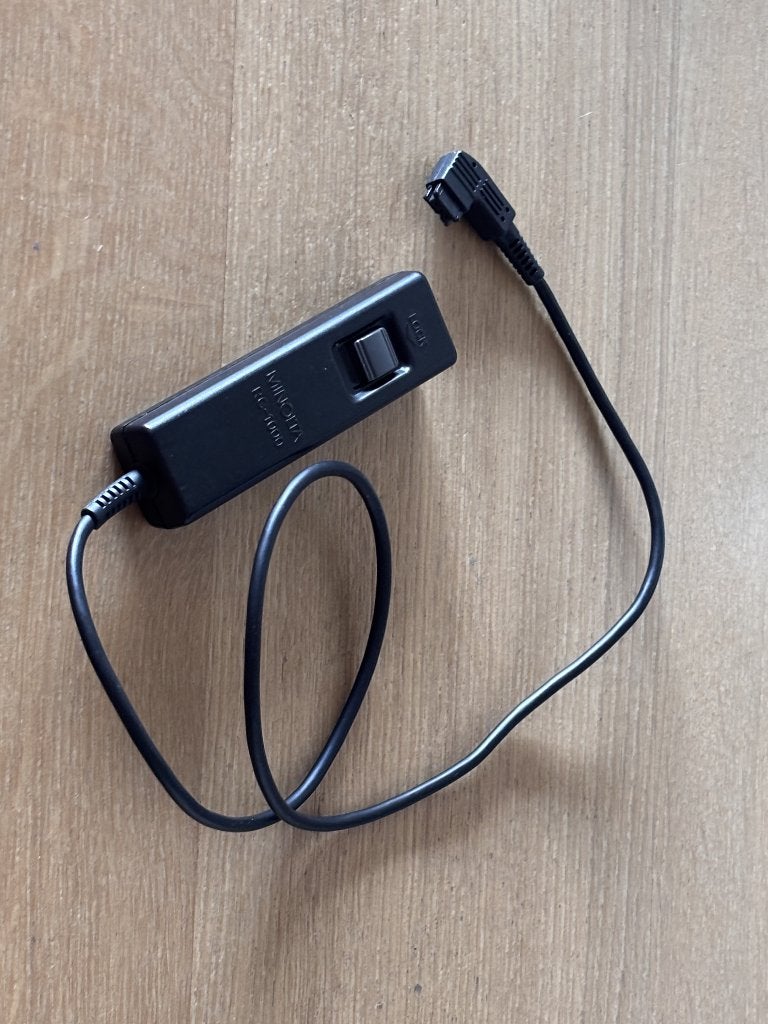 Konica Minolta draadontspanner, Ophalen of Verzenden, Gebruikt