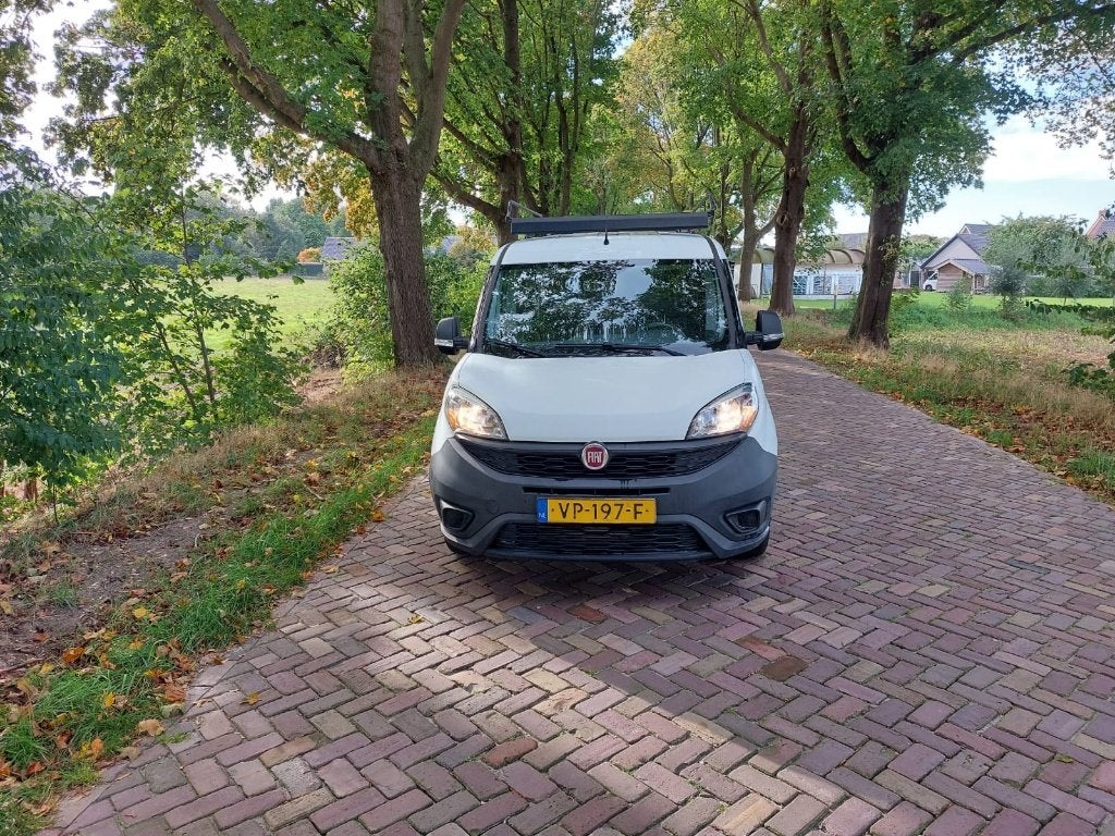 Fiat Doblo 1.3 MJ 16V 75pk 2015, Auto's, Euro 5, Stof, 74 pk, Zwart