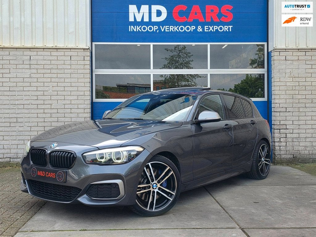 BMW 1-serie M140i xDrive High Executive SCHUIFDAK/MEMORY STO, Gebruikt, Alcantara, 340 pk, 14 km/l