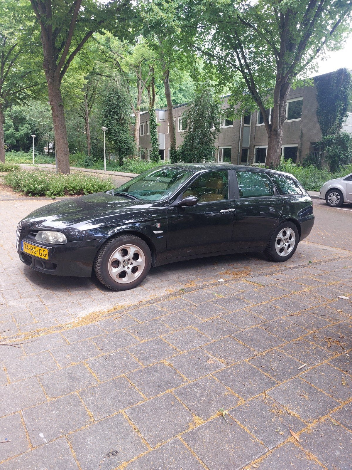 Alfa Romeo 156 1.8 Twin Spark Sportwagon 2005 Zwart, Auto's, Alfa Romeo, Voorwielaandrijving, 4 cilinders, 1290 kg, Zwart