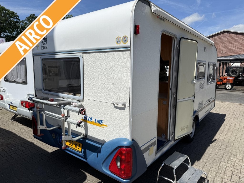 KNAUS BLUE LINE VASTBED TREINZIT VOORTENT-AIRCO-LUIFEL, Caravans en Kamperen, Caravans, Overige typen, Bedrijf, Treinzit, 750 - 1000 kg