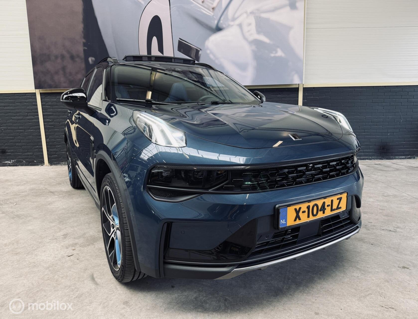 Lynk & Co 01 |Trekhaak|Panodak|Blacked Out|Zwarte hemel|, Auto's, Euro 6, Blauw, 120 €/maand, Origineel Nederlands