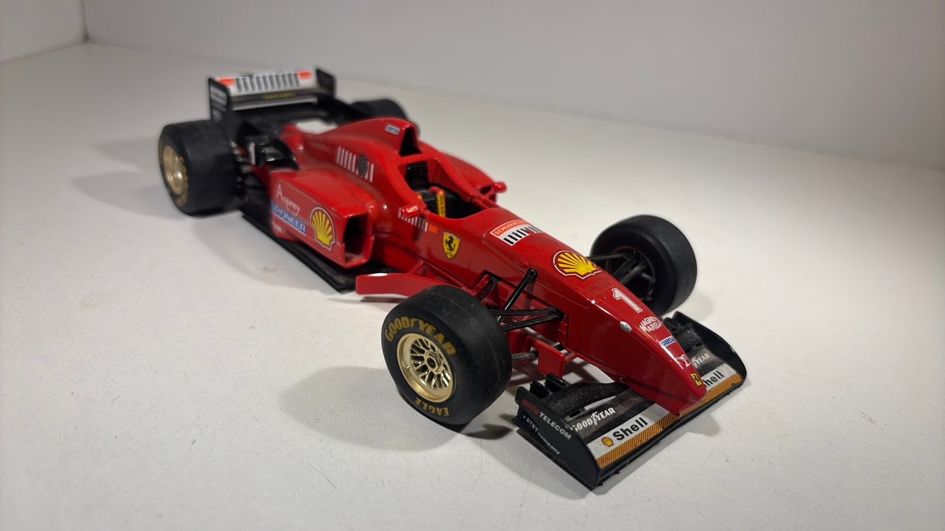 F1 Ferrari f310 m. Schumacher Bburago 1.24, Ophalen of Verzenden, Bburago, A, A