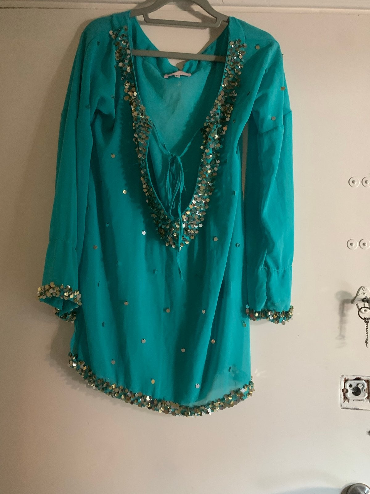 Turquoise tuniek met pailletten, maat M, Maat 38/40 (M), Blauw, Ophalen of Verzenden, Lange mouw