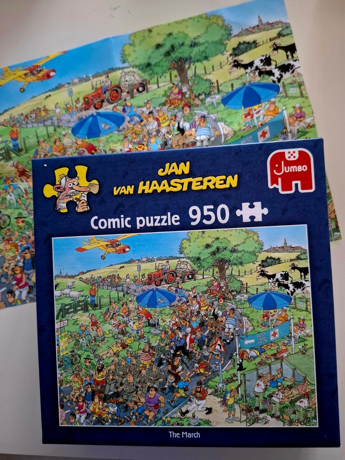 Nieuw Jan van Haasteren 'The March' 950 stukjes + poster, Ophalen of Verzenden, 500 t/m 1500 stukjes, Zo goed als nieuw, Legpuzzel