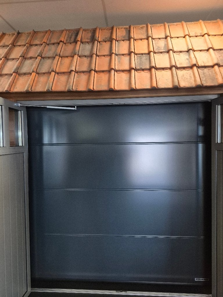 Geïsoleerde sectionaaldeur - Hörmann LPU67, Ophalen, Garagedeur, Zo goed als nieuw, Metaal