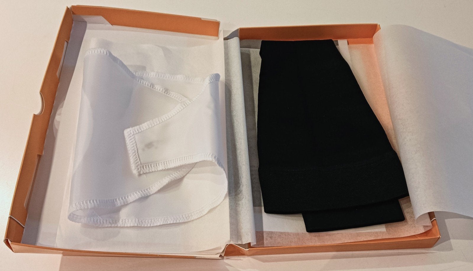 zwarte steun/compressiekous van Maxis micro, met aantrekhulp, Verzenden, Zwart