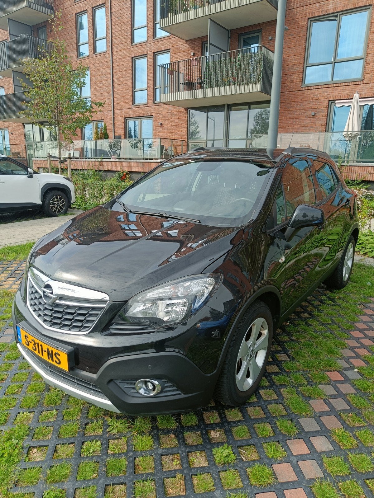 Opel Mokka 1.6 16V 2015 nette en goed onderhouden, Auto's, Voorwielaandrijving, 15 km/l, 4 cilinders, Zwart