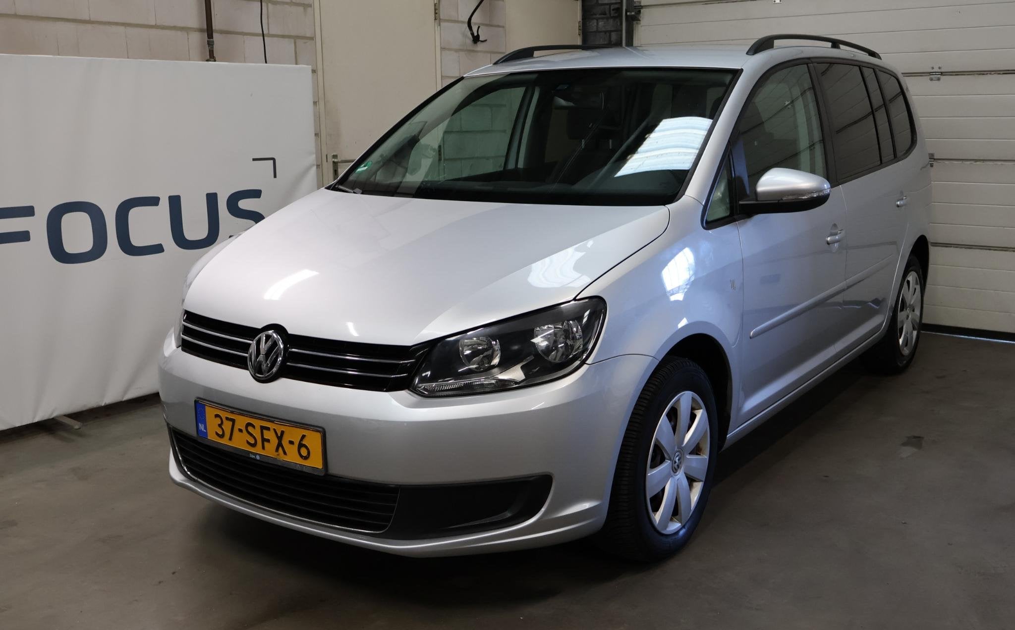 Volkswagen Touran 1.2 TSI Comfortline BlueMotion 7p. NAP 2e, Voorwielaandrijving, Stof, Gebruikt, Zwart